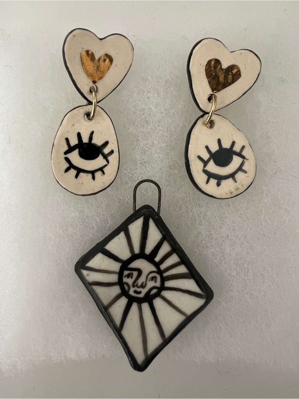 Gabdmade White and Black Sun & Eye Pendant with Heart Drop Earrings
